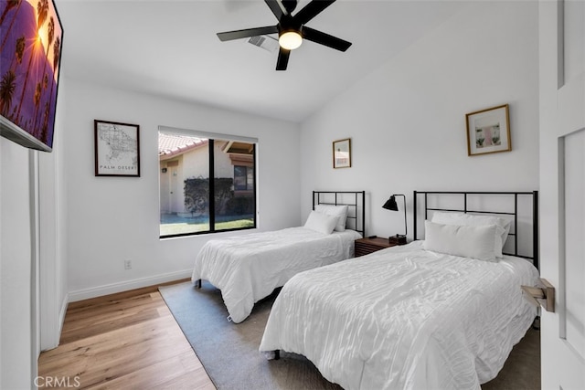 42386 Sultan Ave, Palm Desert, CA 92211 - bedroom featuring vaulted ceiling, wood finished floors, and a ceiling fan