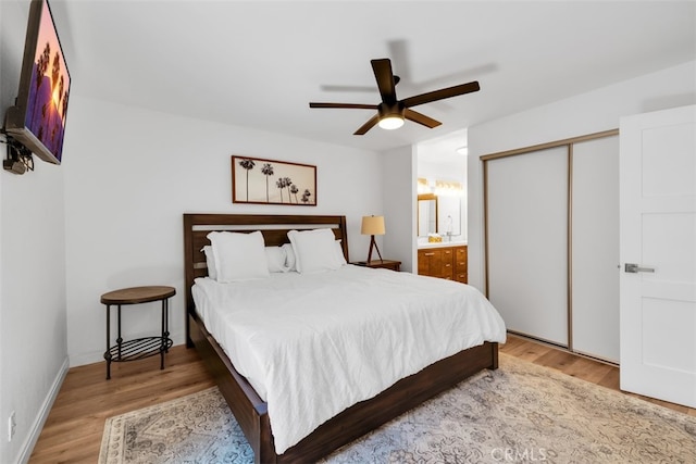 42386 Sultan Ave, Palm Desert, CA 92211 - bedroom featuring wood finished floors, a closet, and a ceiling fan