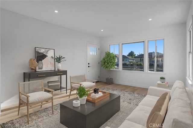 14712 Helwig Ave, Norwalk, CA 90650 - living area featuring light wood-type flooring and recessed lighting