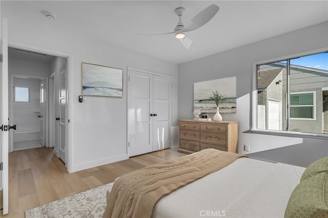 14712 Helwig Ave, Norwalk, CA 90650 - bedroom with light wood-type flooring, multiple windows, a closet, and ceiling fan