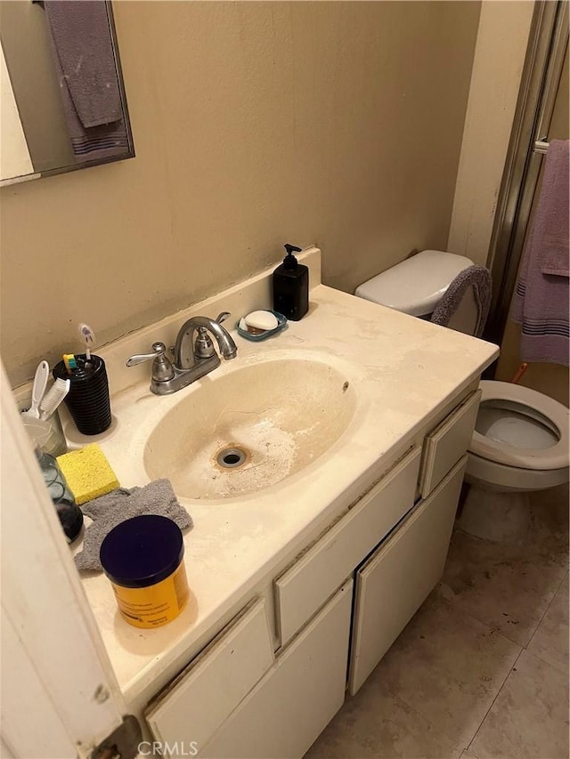 1025 N Tippecanoe Ave Unit 238, San Bernardino, CA 92410 - bathroom with tile patterned flooring and vanity