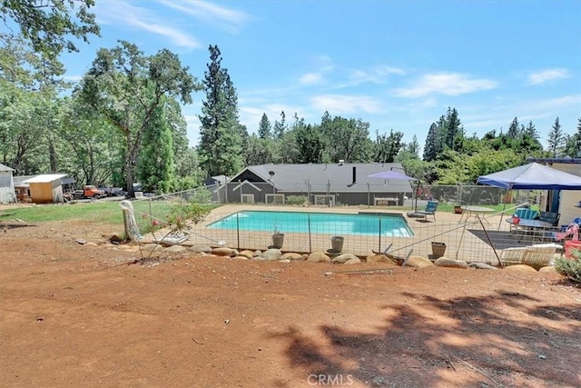 10784 Cole Way, Grass Valley, CA 95945 - view of pool featuring a patio area and view of wooded area
