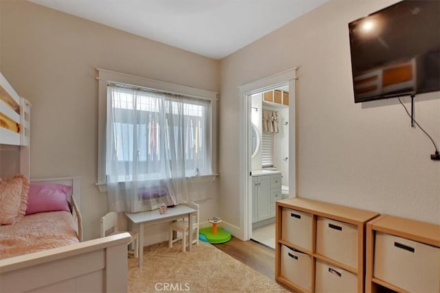 10784 Cole Way, Grass Valley, CA 95945 - bedroom featuring light wood-style floors and ensuite bath