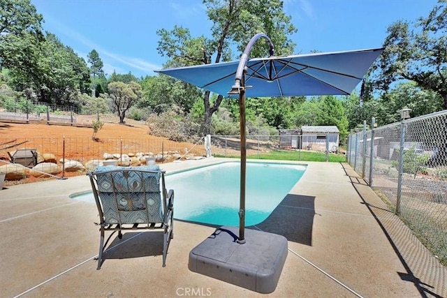 10784 Cole Way, Grass Valley, CA 95945 - view of swimming pool with a patio area and view of scattered trees