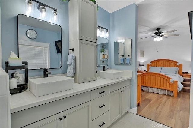 10784 Cole Way, Grass Valley, CA 95945 - bathroom featuring double vanity, ceiling fan, and ensuite bathroom