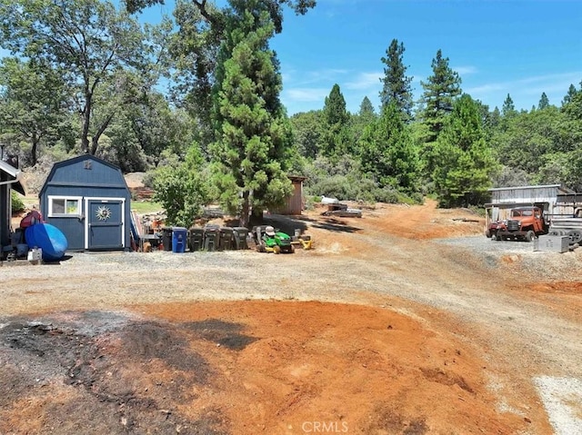10784 Cole Way, Grass Valley, CA 95945 - view of yard featuring a storage unit