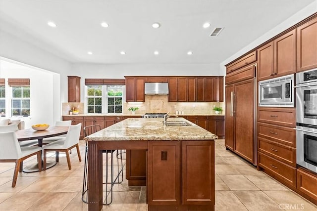 31521 Paseo Campeon, San Juan Capistrano, CA 92675 - kitchen with built in appliances, extractor fan, plenty of natural light, recessed lighting, and backsplash