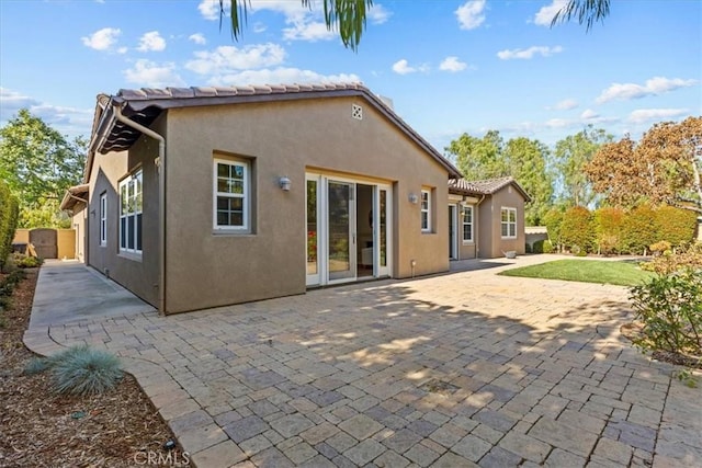 31521 Paseo Campeon, San Juan Capistrano, CA 92675 - rear view of house featuring stucco siding, a patio, and a tile roof