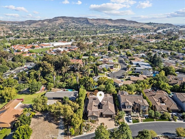 31521 Paseo Campeon, San Juan Capistrano, CA 92675 - aerial overview of property's location featuring a mountain backdrop and nearby suburban area