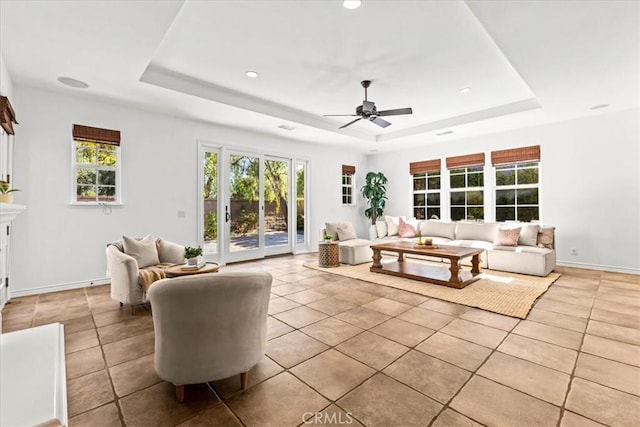 31521 Paseo Campeon, San Juan Capistrano, CA 92675 - living room featuring a tray ceiling, a ceiling fan, light tile patterned floors, and recessed lighting