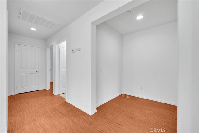 4564 Vincent Way, Riverside, CA 92501 - unfurnished room with light wood finished floors and recessed lighting