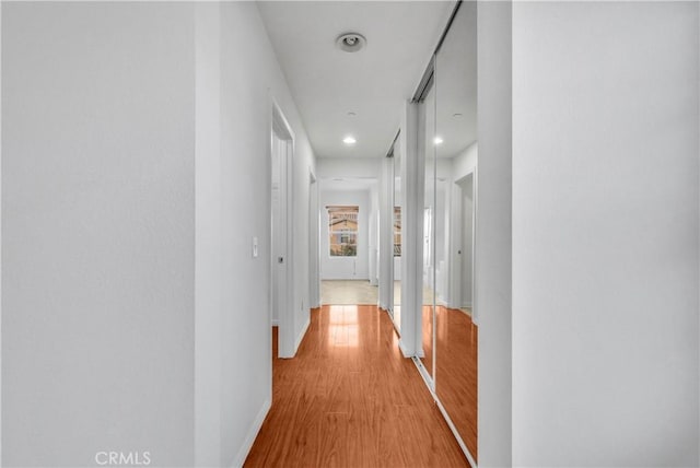 4564 Vincent Way, Riverside, CA 92501 - hall featuring light wood-type flooring and recessed lighting