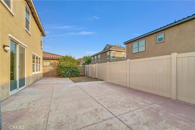 4564 Vincent Way, Riverside, CA 92501 - fenced backyard with a patio area