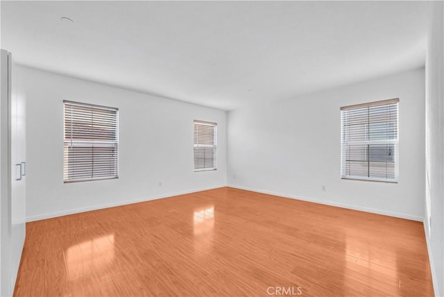 4564 Vincent Way, Riverside, CA 92501 - spare room with light wood-type flooring