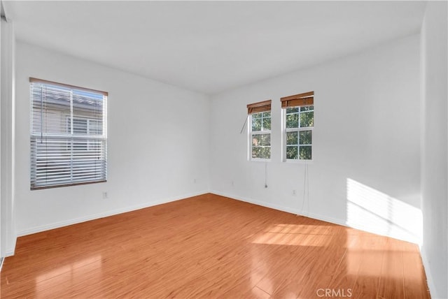 4564 Vincent Way, Riverside, CA 92501 - empty room with wood finished floors and baseboards