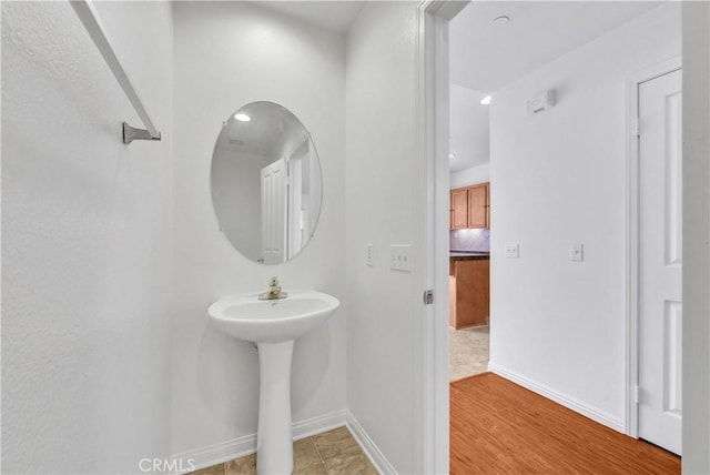 4564 Vincent Way, Riverside, CA 92501 - bathroom featuring recessed lighting and wood finished floors