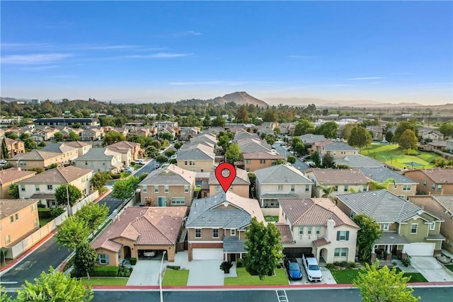 4564 Vincent Way, Riverside, CA 92501 - aerial perspective of suburban area featuring a mountainous background