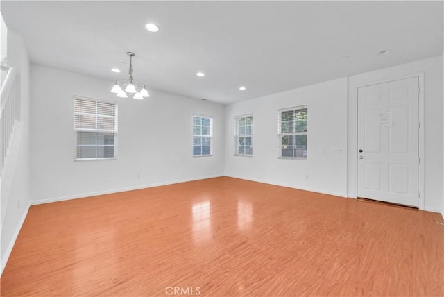 4564 Vincent Way, Riverside, CA 92501 - unfurnished room featuring a chandelier, recessed lighting, and wood finished floors