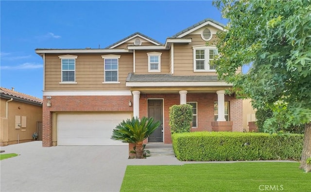4564 Vincent Way, Riverside, CA 92501 - view of front of home featuring brick siding, a garage, concrete driveway, and a front yard