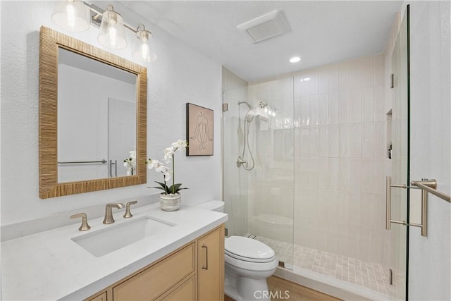 2000 Pacific Coast Hwy Unit 313, Huntington Beach, CA 92649 - bathroom featuring vanity, a shower stall, and recessed lighting