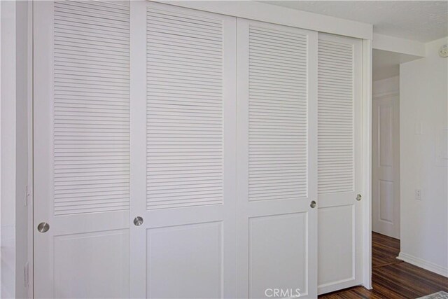 2164 Via Mariposa E Unit D, Laguna Woods, CA 92637 - detailed view of wood finished floors and baseboards