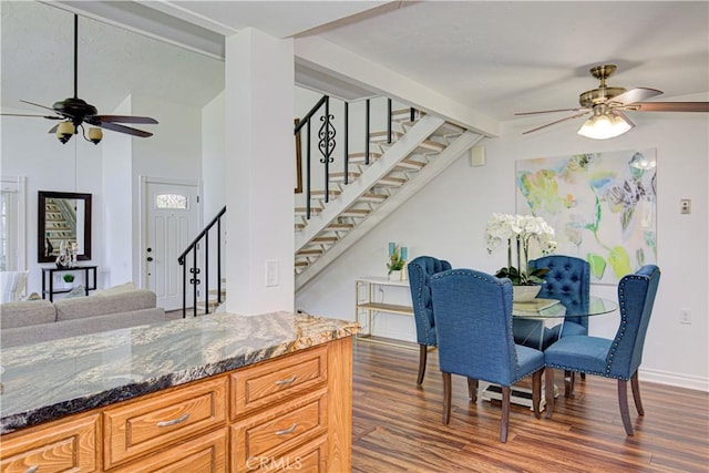2164 Via Mariposa E Unit D, Laguna Woods, CA 92637 - dining space with a ceiling fan, vaulted ceiling, dark wood-style flooring, and stairs