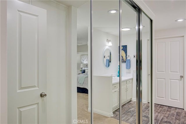 2164 Via Mariposa E Unit D, Laguna Woods, CA 92637 - ensuite bathroom featuring vanity and recessed lighting