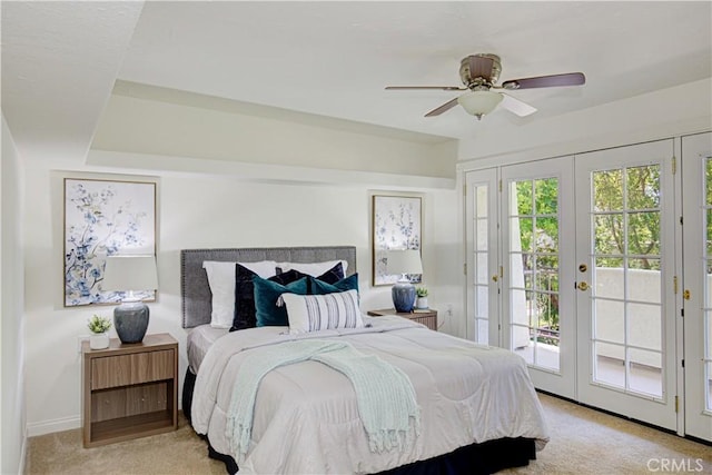 2164 Via Mariposa E Unit D, Laguna Woods, CA 92637 - bedroom featuring access to exterior, carpet floors, and a ceiling fan