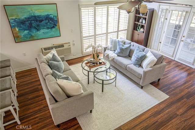 2164 Via Mariposa E Unit D, Laguna Woods, CA 92637 - living area featuring wood finished floors, healthy amount of natural light, ceiling fan, and an AC wall unit