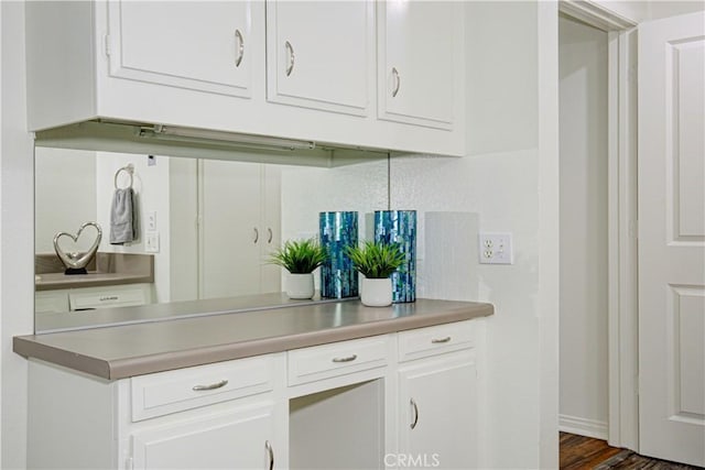 2164 Via Mariposa E Unit D, Laguna Woods, CA 92637 - kitchen with white cabinetry and light countertops