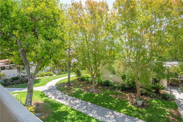 2164 Via Mariposa E Unit D, Laguna Woods, CA 92637 - view of community featuring a lawn