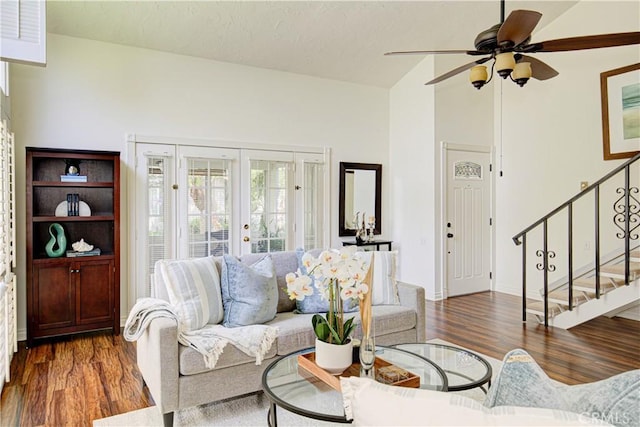 2164 Via Mariposa E Unit D, Laguna Woods, CA 92637 - living room with wood finished floors, stairs, french doors, a ceiling fan, and lofted ceiling