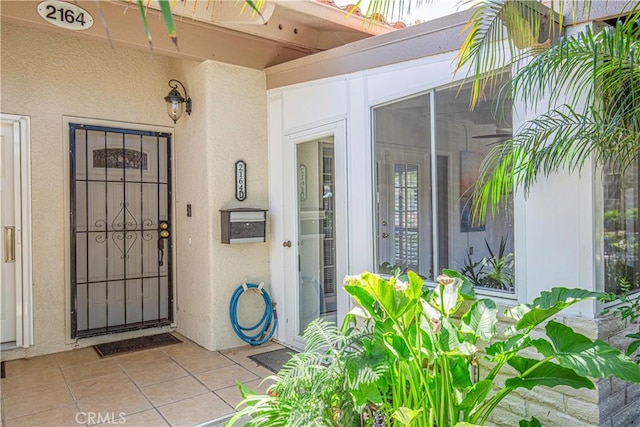 2164 Via Mariposa E Unit D, Laguna Woods, CA 92637 - property entrance with stucco siding
