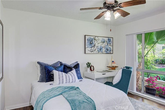 2164 Via Mariposa E Unit D, Laguna Woods, CA 92637 - bedroom with wood finished floors and a ceiling fan