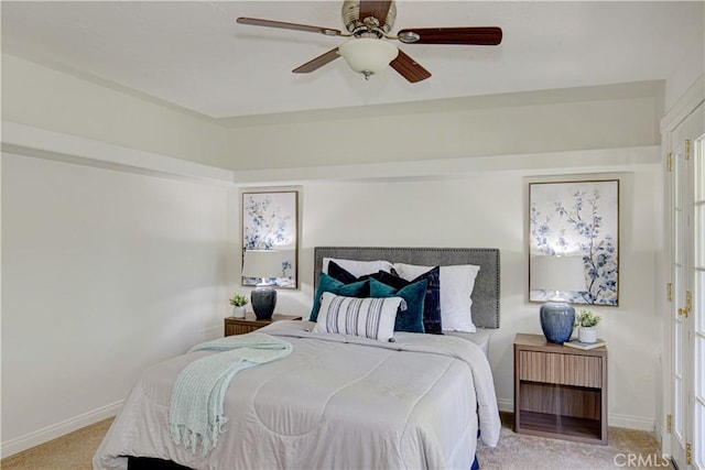 2164 Via Mariposa E Unit D, Laguna Woods, CA 92637 - bedroom with light colored carpet and ceiling fan