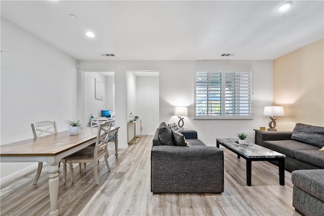 2848 E Berry Loop Privado Unit 52, Ontario, CA 91761 - living area featuring light wood-type flooring and recessed lighting