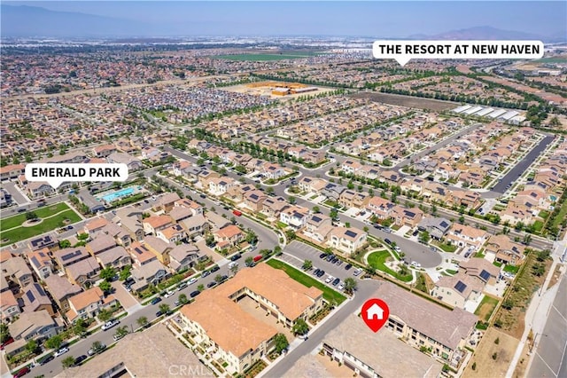 2848 E Berry Loop Privado Unit 52, Ontario, CA 91761 - aerial view of property and surrounding area featuring nearby suburban area