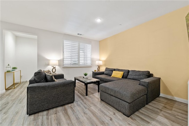 2848 E Berry Loop Privado Unit 52, Ontario, CA 91761 - living room with wood finished floors and baseboards