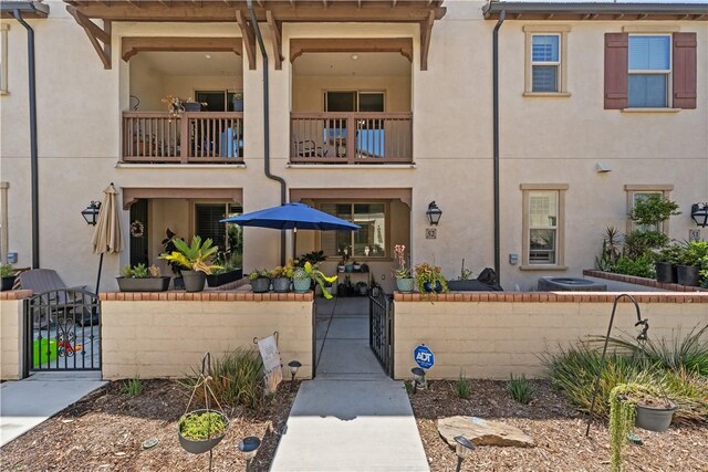 2848 E Berry Loop Privado Unit 52, Ontario, CA 91761 - view of property with a fenced front yard