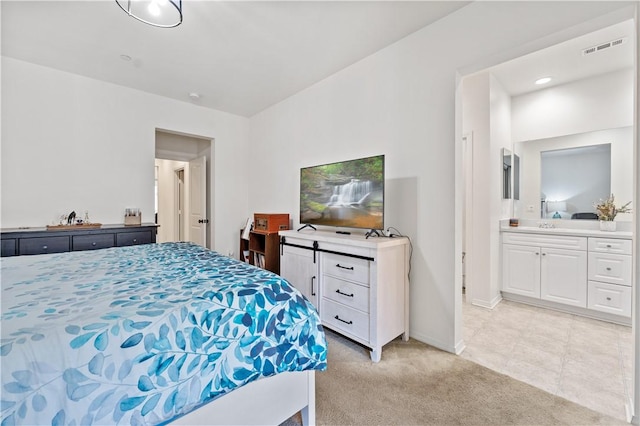 2848 E Berry Loop Privado Unit 52, Ontario, CA 91761 - bedroom featuring light colored carpet and ensuite bath
