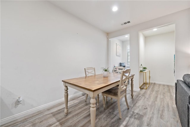 2848 E Berry Loop Privado Unit 52, Ontario, CA 91761 - dining area with light wood finished floors and recessed lighting