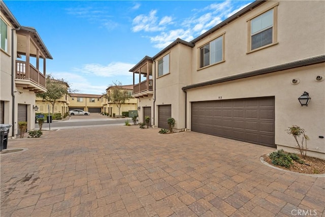 2848 E Berry Loop Privado Unit 52, Ontario, CA 91761 - view of decorative driveway with a residential view