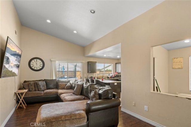 15460 Guava Way, Victorville, CA 92394 - living room featuring dark wood finished floors, vaulted ceiling, and recessed lighting
