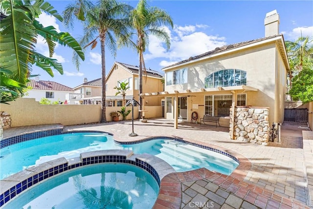4441 Foxrun Dr, Chino Hills, CA 91709 - view of pool featuring a pool with connected hot tub, a patio area, and a fenced backyard