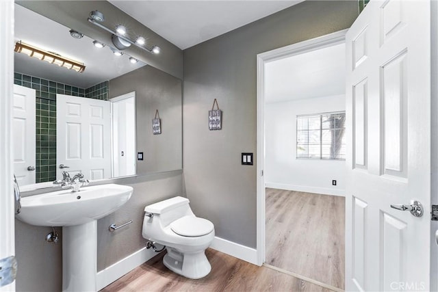 4441 Foxrun Dr, Chino Hills, CA 91709 - half bathroom with toilet and wood finished floors