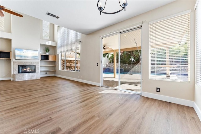 4441 Foxrun Dr, Chino Hills, CA 91709 - unfurnished living room with ceiling fan, wood finished floors, healthy amount of natural light, and built in features