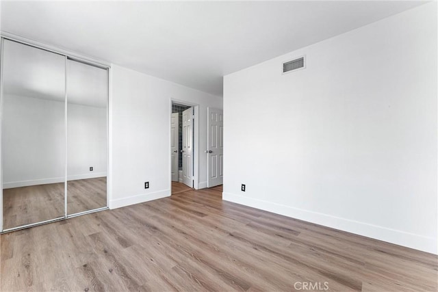 4441 Foxrun Dr, Chino Hills, CA 91709 - unfurnished bedroom featuring wood finished floors and a closet