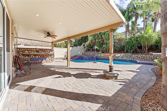 4441 Foxrun Dr, Chino Hills, CA 91709 - fenced backyard featuring ceiling fan, a pool with connected hot tub, and a patio area