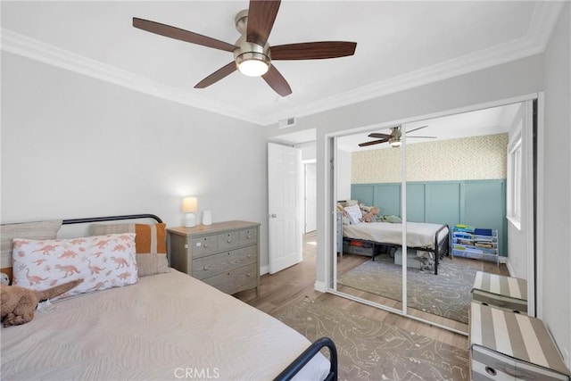 373 N Via Remo, Anaheim, CA 92806 - bedroom with wood finished floors, crown molding, a ceiling fan, and a closet
