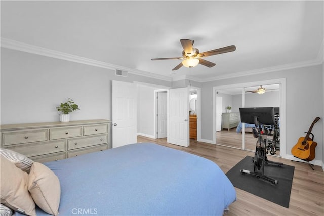 373 N Via Remo, Anaheim, CA 92806 - bedroom featuring wood finished floors, crown molding, ceiling fan, and a closet